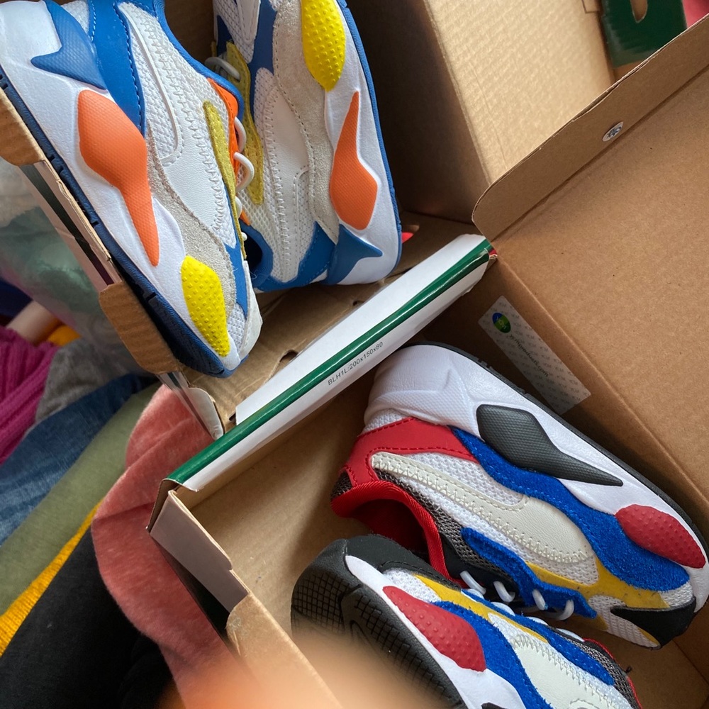 Two pairs of infant puma sneakers
